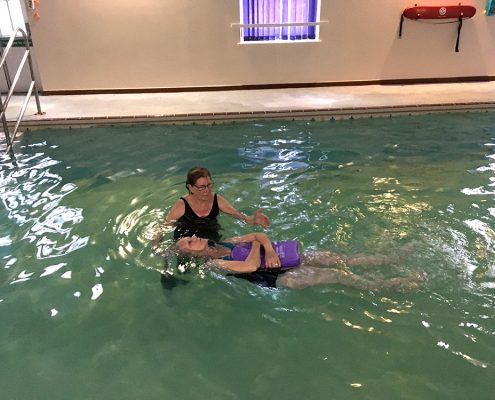 Frances, 82 years, performing back crawl leg kick and a back star float - previously Frances was a non-swimmer, very nervous and scared of the water