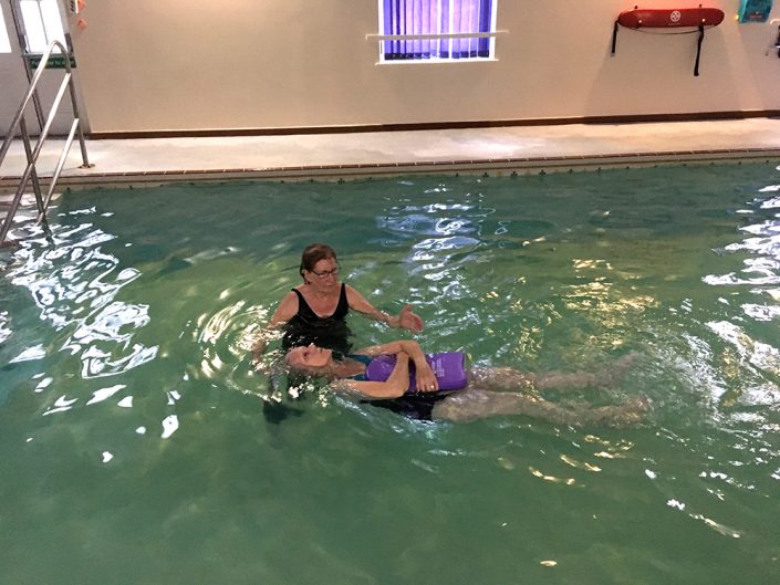 Frances, 82 years, performing back crawl leg kick and a back star float - previously Frances was a non-swimmer, very nervous and scared of the water
