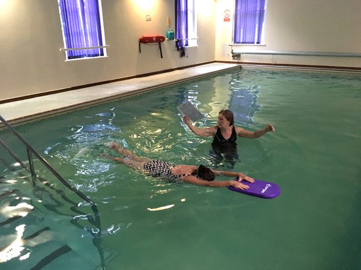 Bernadette performing Front Crawl leg kick....previously Bernadette was unable to put her face into the water and exhale